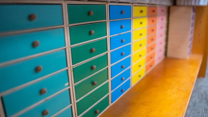 a dramatic shot of drawers with various vibrant colors